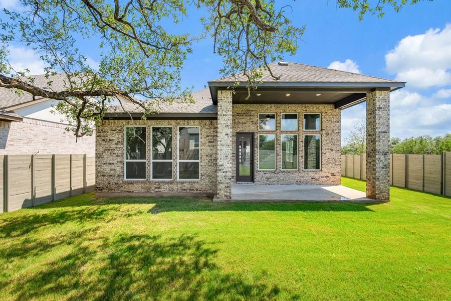 Exterior details and patio area of a home in Wolf Ranch, Georgetown (Image 25).