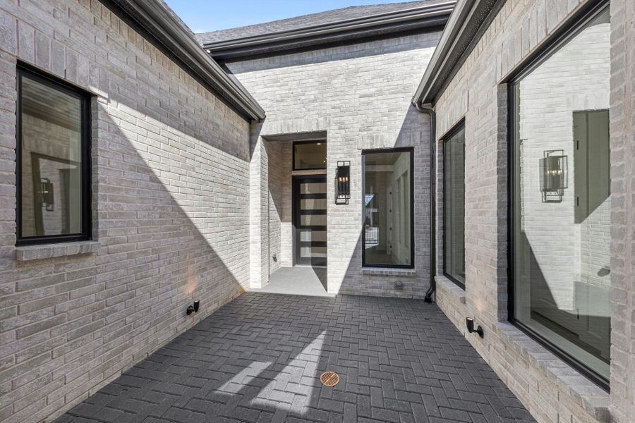 Representative exterior details of a home built from the 5551 by Tradition Homes in Windsong Ranch, Prosper (Image 3).