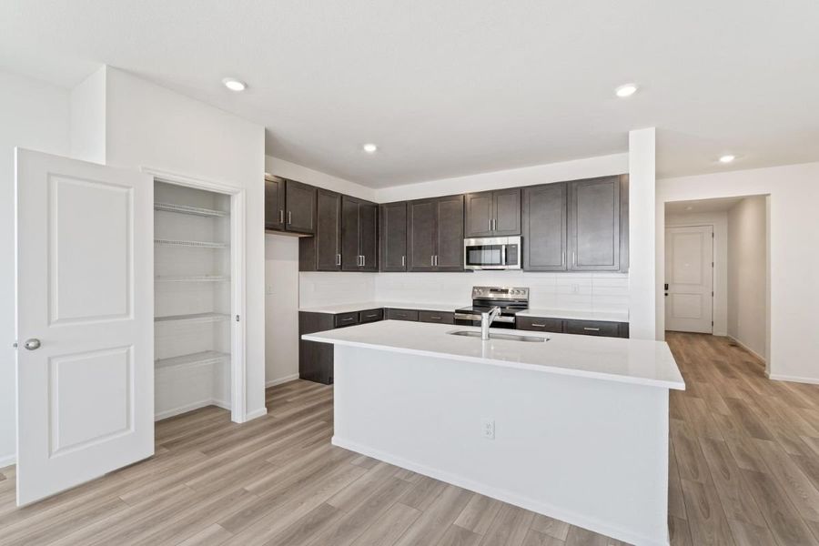 Furnished interior view inside a new home in Bennett Crossing Reserve, Bennett (Image 8).