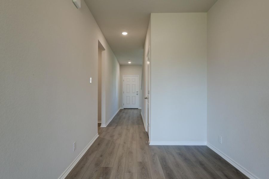 Representative unfurnished interior of a home built from the Placid by Ashton Woods in Meadows at Hennersby Hollow 40's, San Antonio (Image 7).