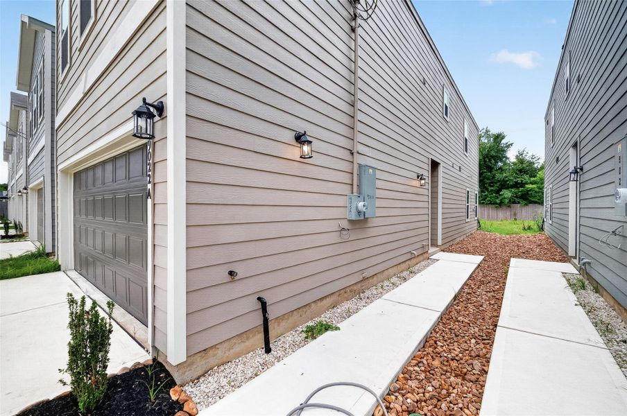 Exterior details and patio area of a home in , Houston (Image 4). Exterior details and patio area of a home in , Houston (Image 4).