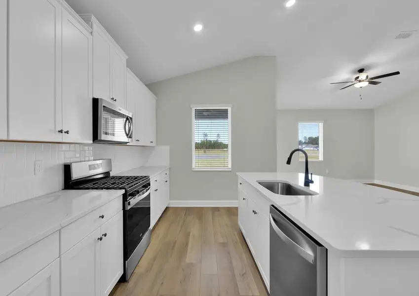 Each kitchen includes upgraded stainless steel appliances