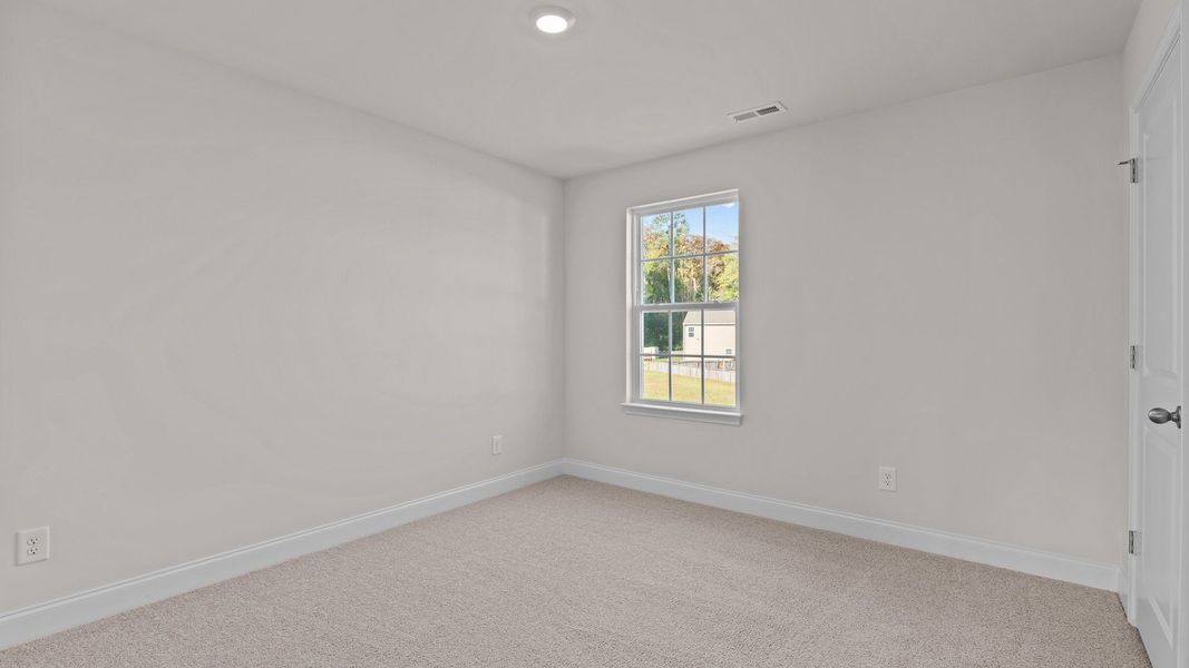 Spacious, unfurnished interior of a new home in Tyler - Home on the Lake, New Bern (Image 19).