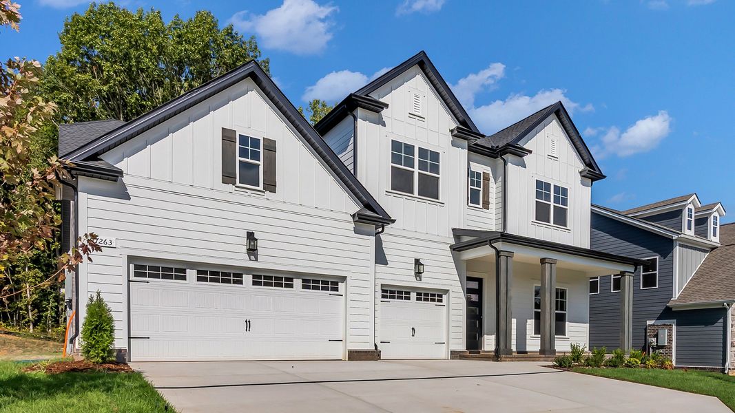 Front exterior of a new home in Brush Creek, Fairview, TN, highlighting curb appeal (Image 22). Front exterior of a new home in Brush Creek, Fairview, TN, highlighting curb appeal (Image 22).