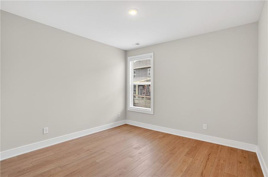 Spacious, unfurnished interior of a new home in The Fairways at Mirror Lake, Villa Rica (Image 35).