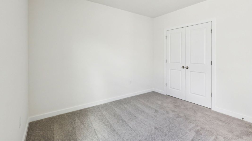 Bedroom in the Baker by DRB Homes in Willowbrook North