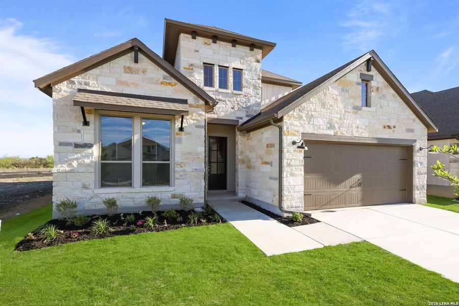 Front exterior of a new home in Nopal Valley, San Antonio, TX, highlighting curb appeal (Image 25). Front exterior of a new home in Nopal Valley, San Antonio, TX, highlighting curb appeal (Image 25).