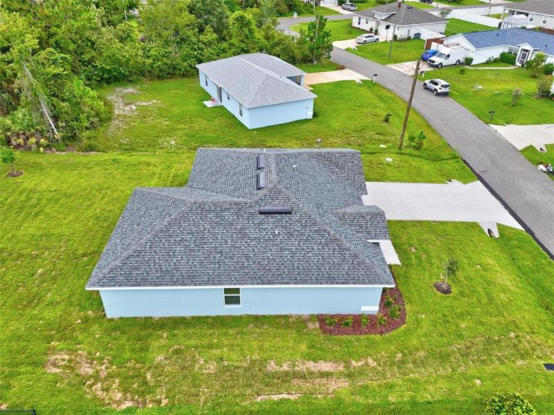 Front exterior of a new home in , Palm Coast, FL, highlighting curb appeal (Image 34).