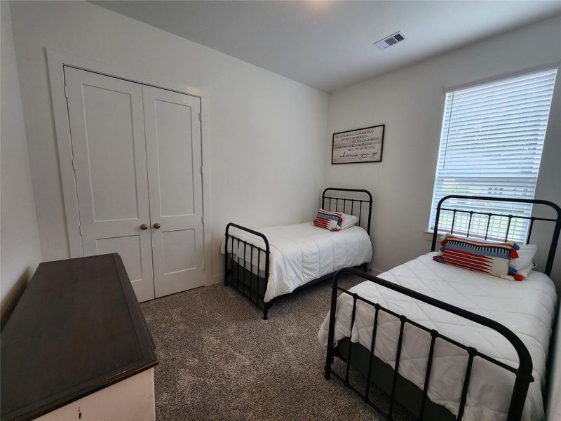 Furnished interior view inside a new home in The Woodlands Hills, Willis (Image 24).