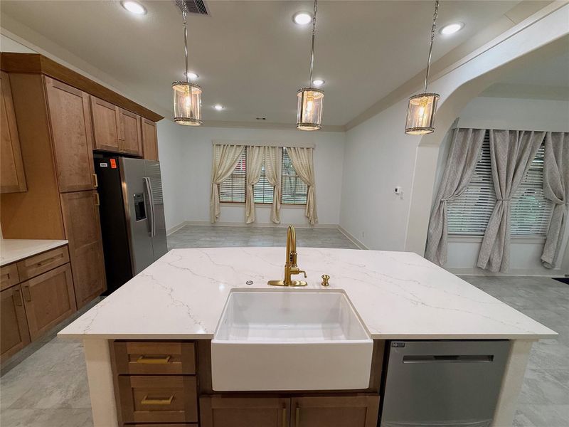 Farm house sink with designer fixture