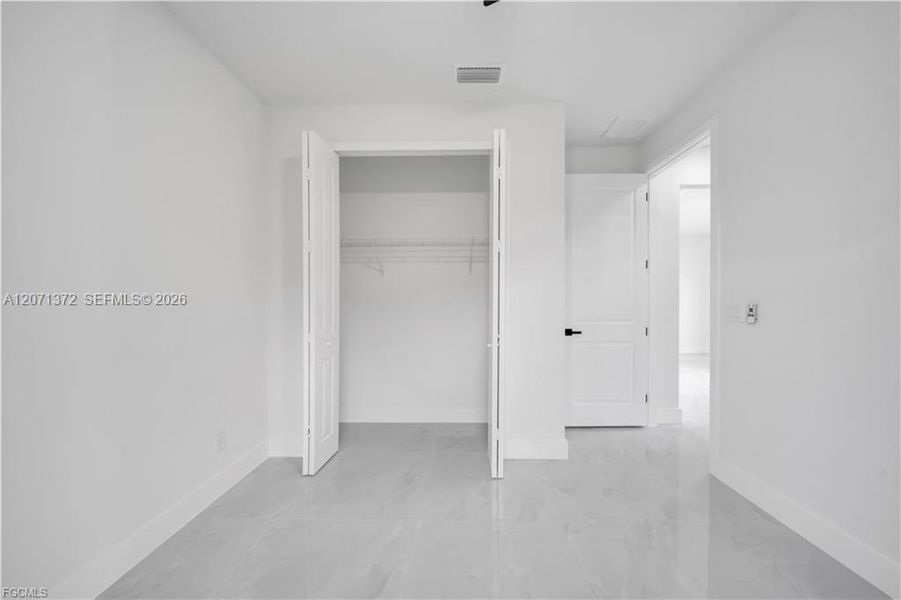 Spacious, unfurnished interior of a new home in , Lehigh Acres (Image 13). Spacious, unfurnished interior of a new home in , Lehigh Acres (Image 13).