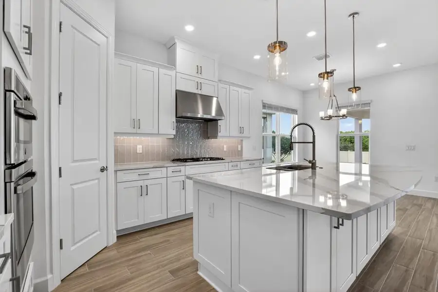 Furnished interior view inside a new home in Center Lake Ranch Community Group Page, St. Cloud (Image 8).