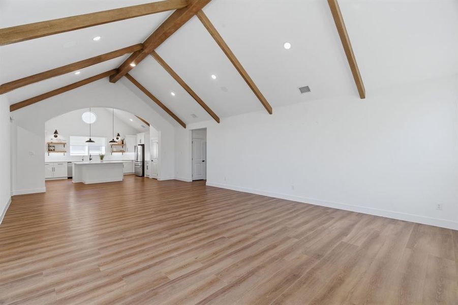 Vaulted ceiling with exposed wood beams Vaulted ceiling with exposed wood beams