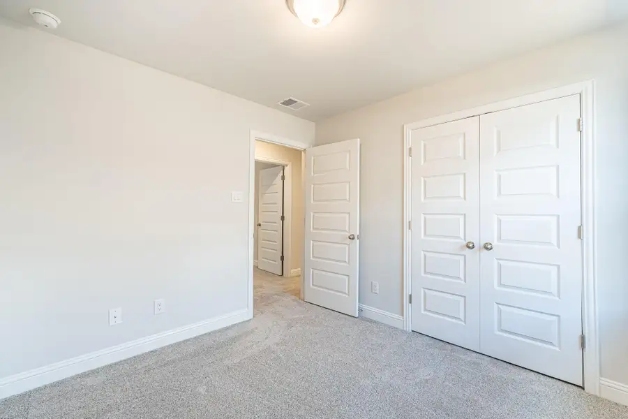 Spacious, unfurnished interior of a new home in Stonebrooke, Conroe (Image 12). Spacious, unfurnished interior of a new home in Stonebrooke, Conroe (Image 12).