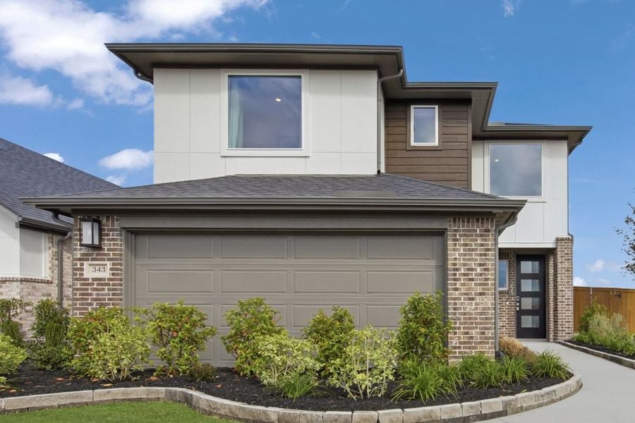 Representative exterior photo of a completed home built from the Juliet by Taylor Morrison in Avalon at Cypress, Cypress, TX (Image 22).
