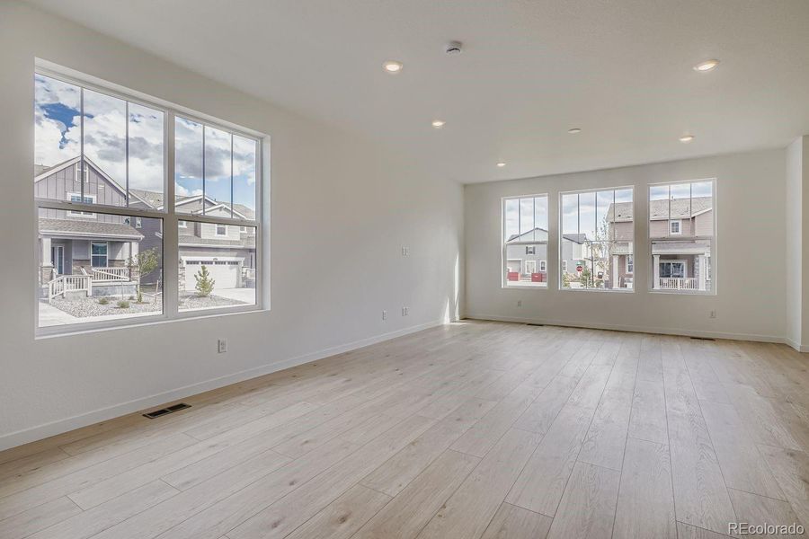 Spacious, unfurnished interior of a new home in Sky Ranch: Pioneer Collection, Watkins (Image 13).