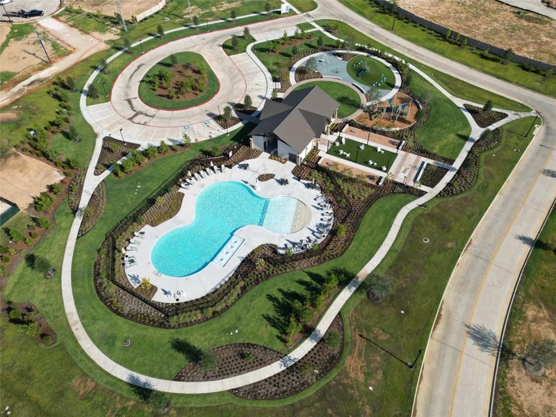 The pool serves as a central hub of excitement, where residents can relax, enjoy lively games, or dive into a refreshing workout.