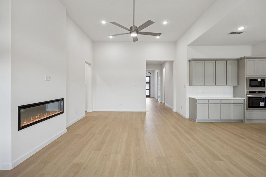 Living Room in the Gilmour II home plan by Trophy Signature Homes – REPRESENTATIVE PHOTO