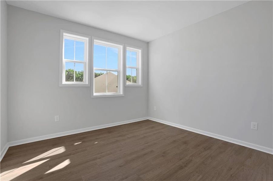 Spacious, unfurnished interior of a new home in The Paddocks at Doc Hughes, Buford (Image 48).