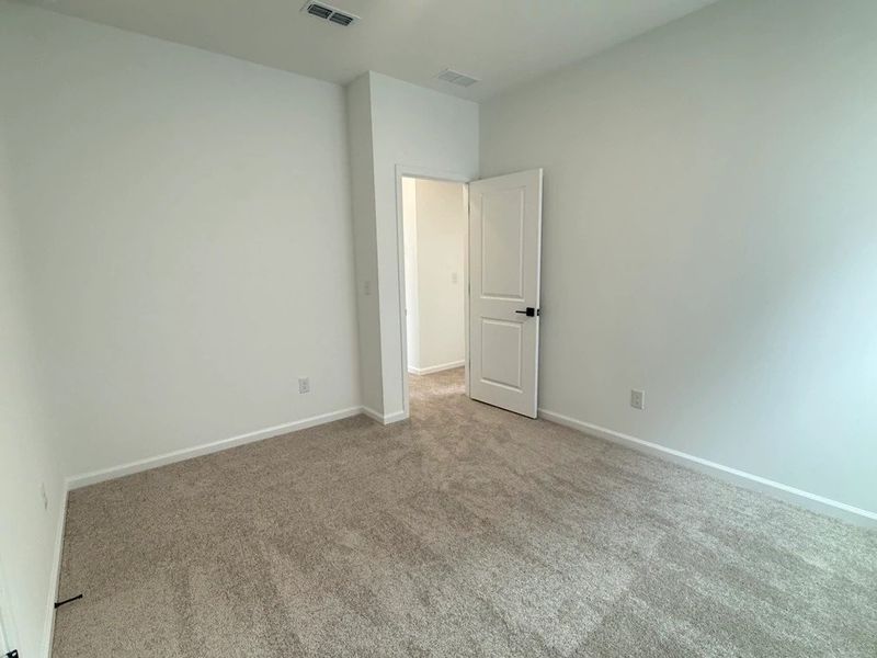 Spacious, unfurnished interior of a new home in The Point, Rolesville (Image 22).