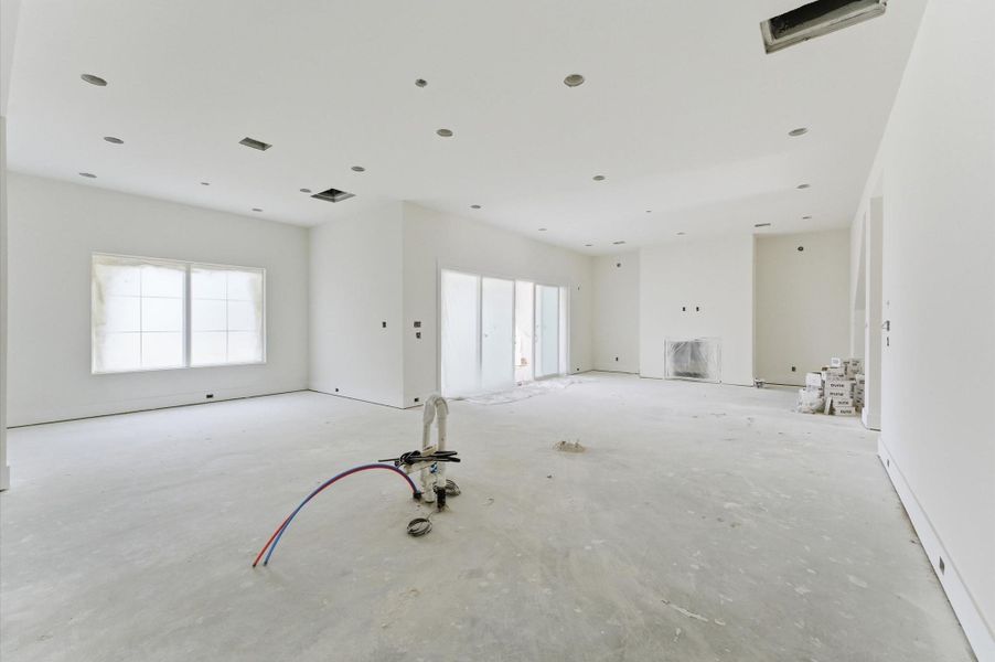 Spacious kitchen, dining and living areas.