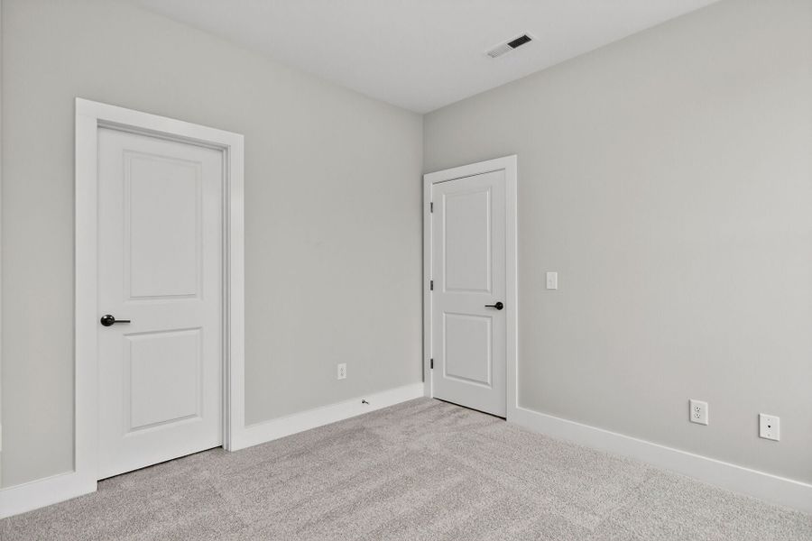 Representative unfurnished interior of a home built from the Ember B by Homes by Dickerson in Chatham Park, Pittsboro (Image 10).