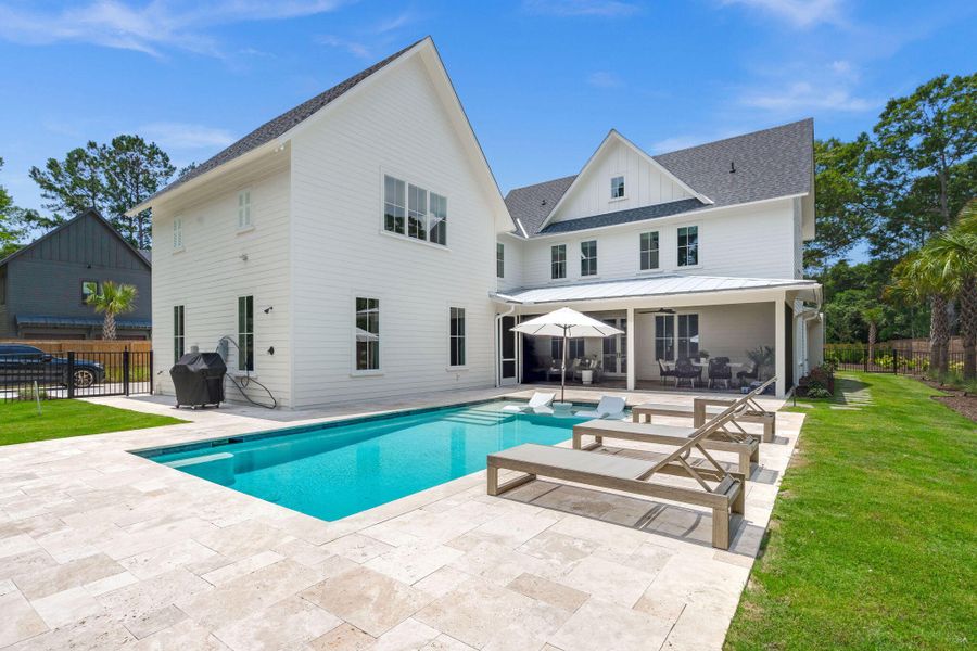 Exterior details and patio area of a home in , Johns Island (Image 33).