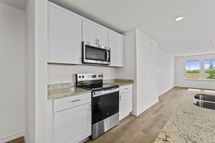 Furnished interior view inside a new home in Dove Song, Marion (Image 10).