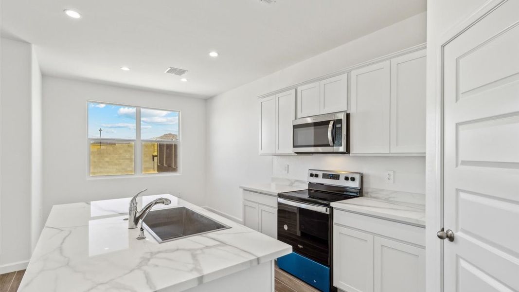 Furnished interior view inside a new home in Entrada Del Oro, Gold Canyon (Image 11).