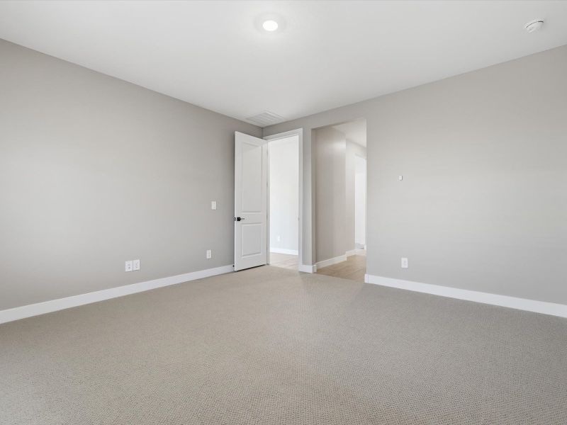 Spacious, unfurnished interior of a new home in Blossom Rock Reserve Series, Apache Junction (Image 10). Spacious, unfurnished interior of a new home in Blossom Rock Reserve Series, Apache Junction (Image 10).