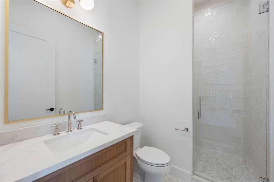 Full bath on first floor with custom built white oak vanity