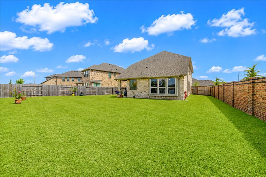 Exterior details and patio area of a home in , Katy (Image 25). Exterior details and patio area of a home in , Katy (Image 25).