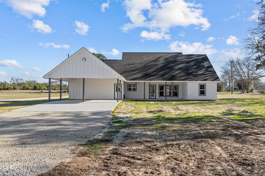 Front exterior of a new home in , Grapeland, TX, highlighting curb appeal (Image 21).