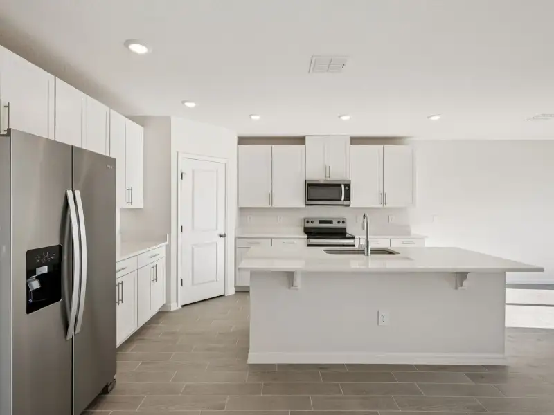 Furnished interior view inside a new home in Oakfield Trails - Classic Series, Parrish (Image 3).