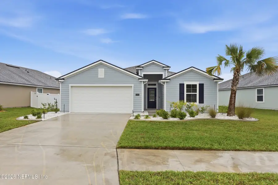 Front exterior of a new home in Cross Creek, Green Cove Springs, FL, highlighting curb appeal (Image 2).