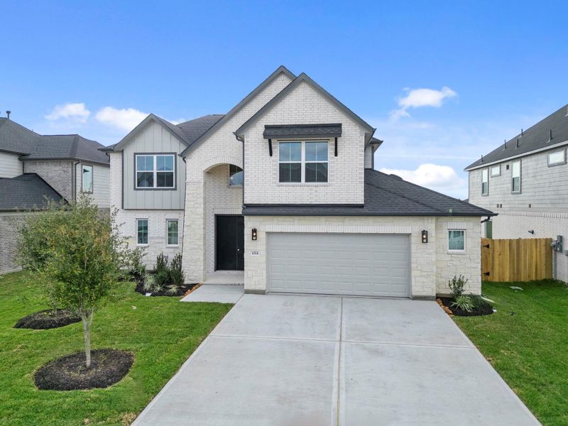 Front exterior of a new home in Briarwood Crossing, Rosenberg, TX, highlighting curb appeal (Image 21).