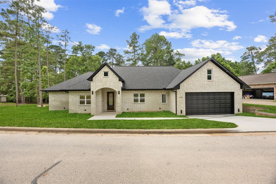 Custom new construction with modern architecture and striking curb appeal.
