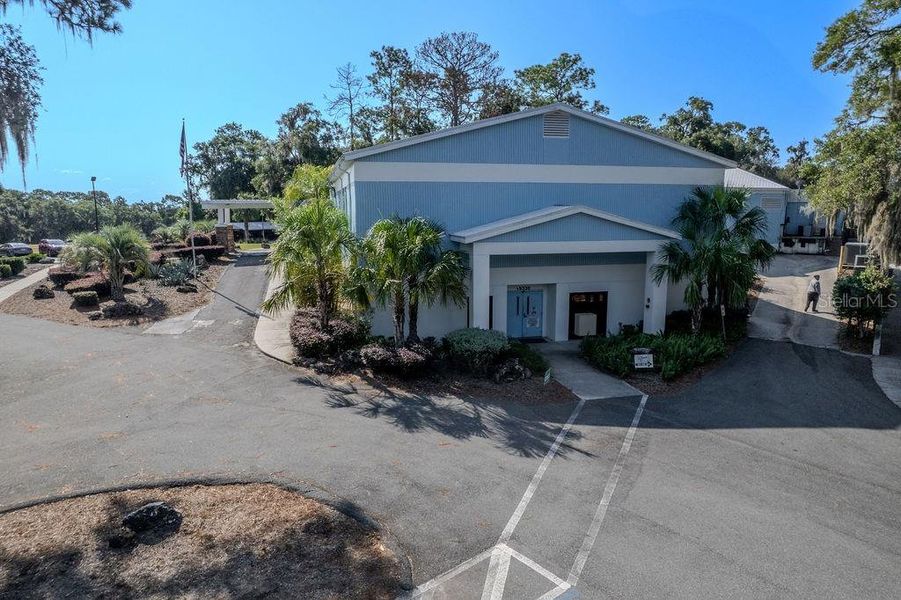 Front exterior of a new home in Grand Park North, Dunnellon, FL, highlighting curb appeal (Image 23).