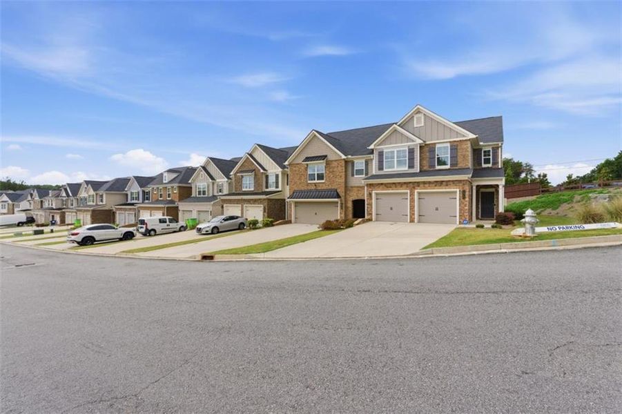 Front exterior of a new home in Park Center Pointe, Mableton, GA, highlighting curb appeal (Image 26).
