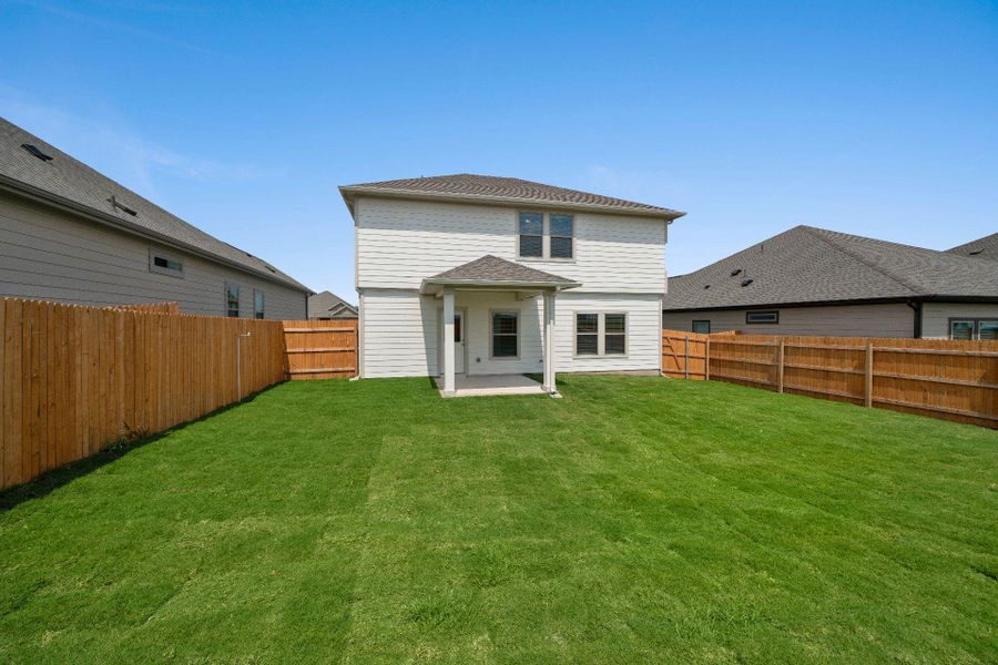 Rear of Home and Private Backyard