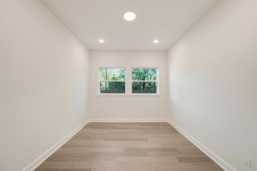 Study at 1st floor offers high ceiling, extra lighting and laminate floors!