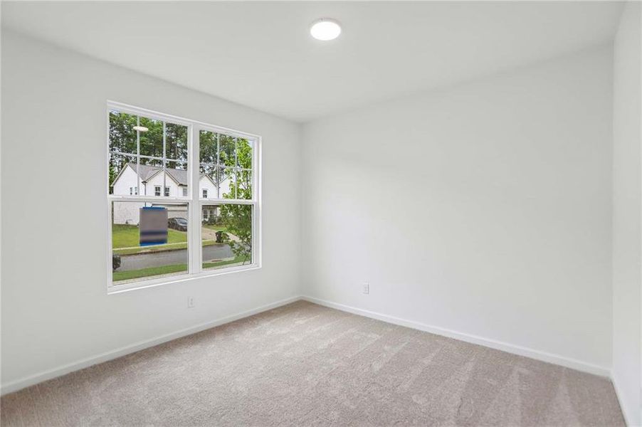 Spacious, unfurnished interior of a new home in The Pointe at Heron Bay, Locust Grove (Image 15).