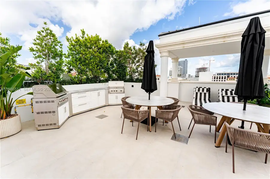 Exterior details and patio area of a home in , Coral Gables (Image 1). Exterior details and patio area of a home in , Coral Gables (Image 1).
