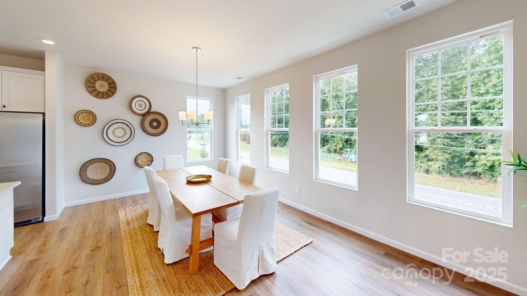 Furnished interior view inside a new home in Vanguard at Vermillion, Huntersville (Image 11).