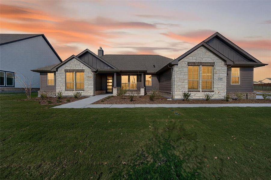 Front exterior of a new home in Fairview Meadows, New Fairview, TX, highlighting curb appeal (Image 19). Front exterior of a new home in Fairview Meadows, New Fairview, TX, highlighting curb appeal (Image 19).