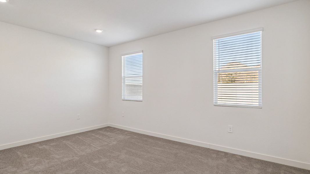 Representative unfurnished interior of a home built from the Hayden by D.R. Horton in The Ridge at Stone Butte, Phoenix (Image 33).