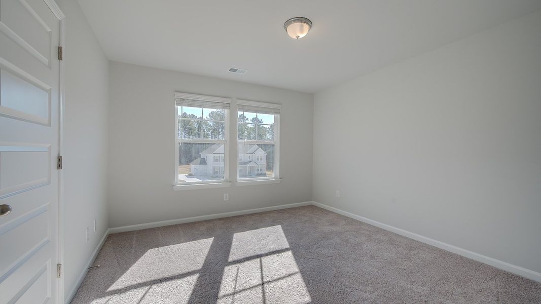 Furnished interior view inside a new home in Riverbend Overlook, Fayetteville (Image 14). Furnished interior view inside a new home in Riverbend Overlook, Fayetteville (Image 14).