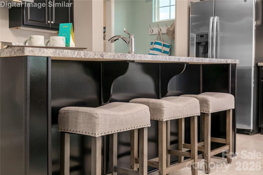 Island seating for three — perfect for pancakes, pep talks, and plotting your next dinner party! Island seating for three — perfect for pancakes, pep talks, and plotting your next dinner party!