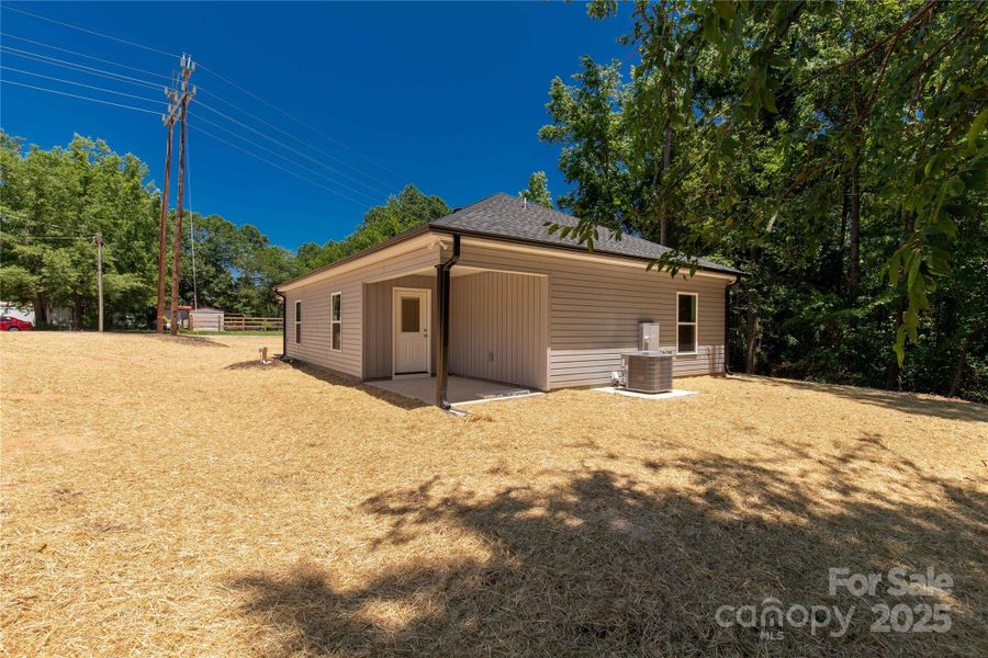Front exterior of a new home in , Clover, SC, highlighting curb appeal (Image 16).