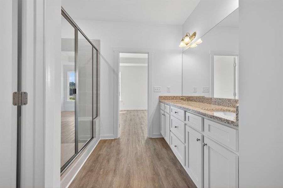 Furnished interior view inside a new home in Sutton's Landing, Statham (Image 13).